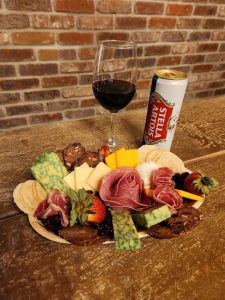 Enjoy our small plates at our speakeasy at Lonz Winery on Middle Bass Island / The Island Grind.